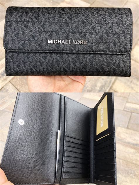 michael kors logo signature large black wallets|michael kors wallet female.